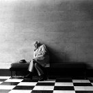 Old man in building lobby